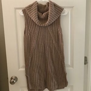 Tan colored sleeveless sweater